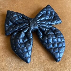 Black quilted faux leather hair bowl clip